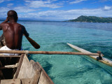 Boatman on Dugout Canoe Photographic Print by Olivier Cirendini