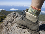 Hiker's Boot on Summit of Pico Ruivo Mountain Photographic Print by Holger Leue