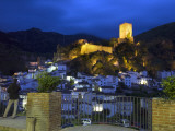 Tourist Taking Picture from Pintor Zabaleta Balcony of La Yedra Castle Illuminated at Night Photographic Print by Diego Lezama