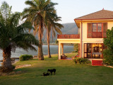 House by Water Photographic Print by Greg Johnston
