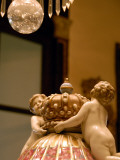 Detail of Cherubs Atop Vase on Central Table in Sultans Memorial Room of Dolmabachce Palace Photographic Print by Mark Avellino