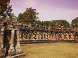 Tourist Group with Guide at Terrace of the Elephantsts, Angkor Thom Photographic Print by Christer Fredriksson