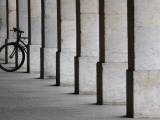 Bicycle Wheel in Arcade Photographic Print by David Borland