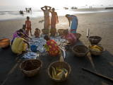 Villagers Looking at Fishing Catch on Beach Photographic Print by Johnny Haglund