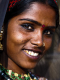 Portrait of Woman in Traditional Dress at the Pushkar Camel Fair Photographic Print by Kimberley Coole