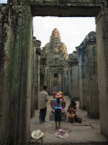 Local Family Paying Respects at Bayon Temple Photographic Print by Felix Hug