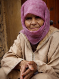 Portrait of Elderly Woman with Facial Tattoo on Her Forehead Photographic Print by Kimberley Coole