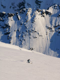 Woman Skiing on Daltinden in Midnight Sun Photographic Print by Christian Aslund