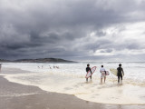 Young Surfers Entering Sea at Meron Beach Photographic Print by Diego Lezama