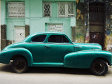 Classic 1950's Car Parked Outside House in Chinatown District Photographic Print by Christian Aslund