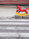 Plastic Rocking Horse in Front of Toy Stall , Gallipoli Photographic Print by David Borland