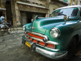 Vintage 1950's Car Parked on Street in Vedado District Photographic Print by Christian Aslund