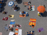 Overhead of Sunbathers Fotografisk trykk av Karl Blackwell