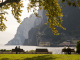 Tourists at a Park Beside Lago Di Garda (Lake Garda) Photographic Print by Glenn Van Der Knijff