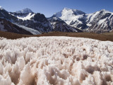 Snow Pinnacles ('Penitientes') at Rio Colorado Headwaters, Cerro Mercedario (6770M) in Background Photographie par Grant Dixon