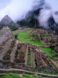 Fog Above Terraced Inca Ruins Photographic Print by Jeffrey Becom