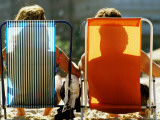 Man and Woman on Beach Chairs, Copacabana Beach Photographic Print by Tom Cockrem