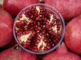 Pomegranates in Carmel St Market Photographic Print by Simon Foale