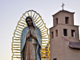 Mother Mary Sculpture with Church Belltower in Background Photographic Print by Ray Laskowitz
