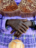 Folded Hands of Herero Woman in Traditional Dress Photographic Print by Tom Cockrem