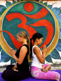 Yoga Practitioners Meditating in Lotus Pose Photographic Print by Christer Fredriksson