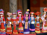 Dolls in Hill-Tribe Costumes for Sale at Sunday Market Photographic Print by Nicholas Reuss