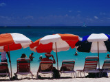 People in Sea and under Beach Umbrellas at Philipsburg Beach on Great Bay. Fotografisk tryk af Richard l'Anson
