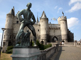 Statue of Lange Wapper in Front of Het Steen-The 13th Century Castle. Fotografisk trykk av Bruce Bi