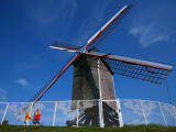 Two Small Girls Looking Up at Sint-Janshuis Windmill Photographic Print by Ruth Eastham & Max Paoli