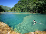 Visitors Swimming in Turquoise-Coloured Waters of Semuc Champey Photographic Print by Paul Kennedy