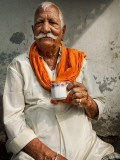 Man Drinking His Afternoon Chai Photographic Print by April Maciborka