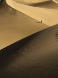 Hiker on Stovepipe Wells Sand Dunes Photographic Print by Tyler Roemer