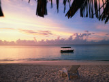 Tourist Boat Moored on the Sea at Sunset Photographic Print by Allan Montaine