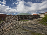 Dome of Temppeliaukio Underground Church Prodruding from Surrounding Bedrock Photographic Print by Manfred Gottschalk