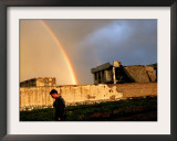 An Afghan Man Walks Past Destroyed Buildings Occupied by Refugees after a Heavy Rain Framed Photographic Print