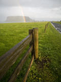 Rainbow and Volcanic Outcrop known as the Nut Photographic Print by Andrew Bain