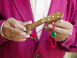 Salesman Tuning Miniature Charanga Photographic Print by Brent Winebrenner