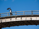 Pedestrian Carrying Parasol, on Kinta-Kyo Five-Arched Bridge Photographic Print by Antony Giblin