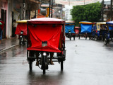 Mototaxis with Protective Rain Covers Lámina fotográfica por Paul Kennedy
