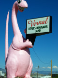 Pink Dinosuar Greeting Visitors Photographic Print by Wade Eakle