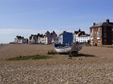 Pebble Beach and Seafront Buildings Photographic Print by Neil Setchfield