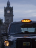 Taxi with Balmoral Hotel in Background Photographic Print by Will Salter