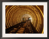 An Empty Tourist Subway Car Runs Through Illuminated Tunnel Framed Photographic Print