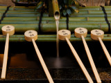Detail of Purification Fountain at Sanjo Temple in Gion Photographic Print by Mark Hemmings