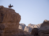 Desert Landscape with Donkey Rider on Ridge-Top Photographie par Simon Foale
