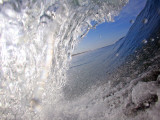 Surfer's Perspective Looking Out Barrel of Wave, at Popular Surfing Beach Playa Aserradores Fotografisk tryk af Paul Kennedy