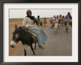 Sudanese Women Ride Donkeys at the Entrance of the Zamzam Refugee Camp Framed Photographic Print