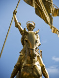 Gold Plated Statue of St. Joan of Arc in the French Quarter on Decator Street Photographie par Ray Laskowitz