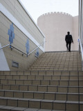 Businessman Ascending Staircase Photographic Print by Brent Winebrenner