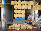 Men and Boys at Traditional Afghan Bakery Photographic Print by Tony Wheeler
